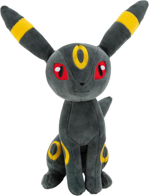 Profil de la peluche Umbreon montrant les grandes oreilles et la queue sombre