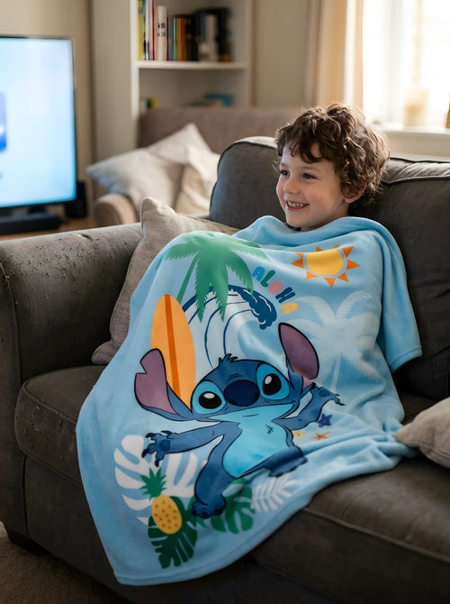 Plaid Polaire Stitch 100x150 cm Bleu - Couverture Douce Disney Lilo & Stitch en situation d'utilisation