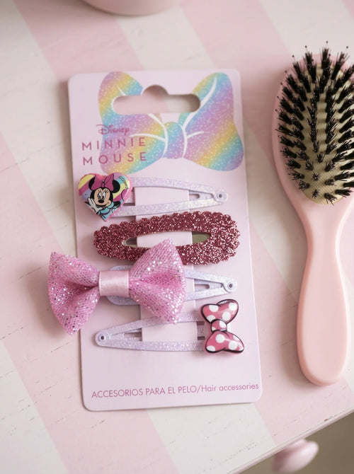 Pinces à cheveux Minnie Mouse rose mis en scène dans un décor du quotidien