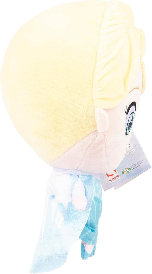 Gros plan sur le visage souriant de la peluche Elsa avec ses grands yeux