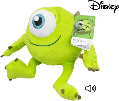 Gros plan sur le grand œil et le sourire de la peluche Mike Wazowski