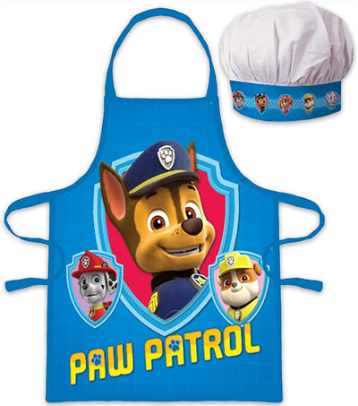 Tablier enfant bleu Pat' Patrouille avec toque assortie posé à plat sur fond clair