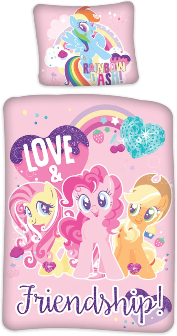 Parure de lit bébé My Little Pony rose installée sur un lit à barreaux