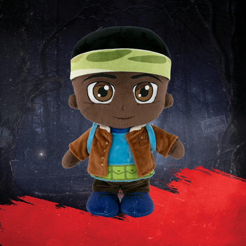 Peluche Lucas Stranger Things 26 cm posée sur un lit d’enfant en décoration