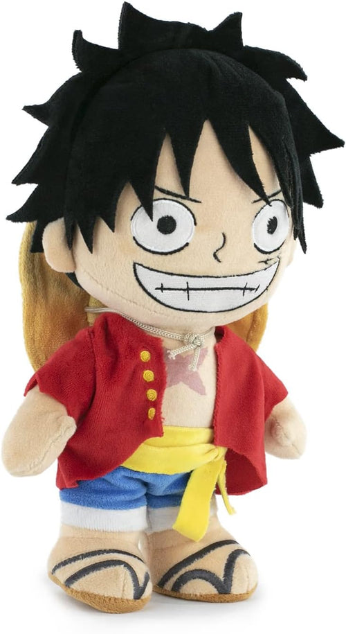 Gros plan sur le visage souriant de la peluche Luffy avec son chapeau de paille