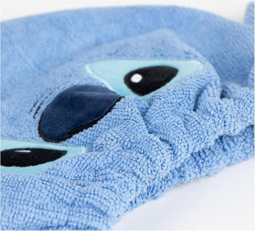 Serviette à cheveux Stitch dépliée montrant sa forme et sa couleur bleue