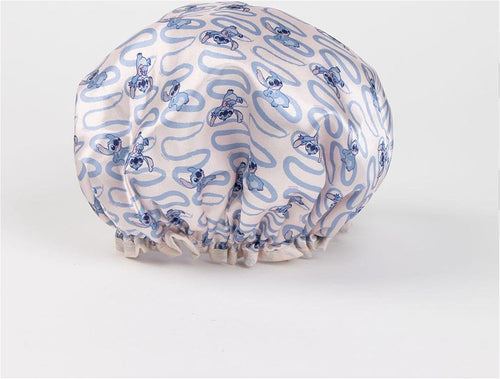 Bonnet de douche Stitch jaune plié prêt à être rangé dans la salle de bain