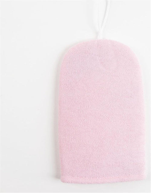 Zoom sur la texture douce et exfoliante du gant de bain Hello Kitty