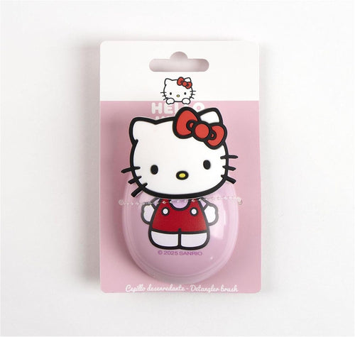 Brosse démêlante Hello Kitty posée à plat montrant la forme générale et le manche