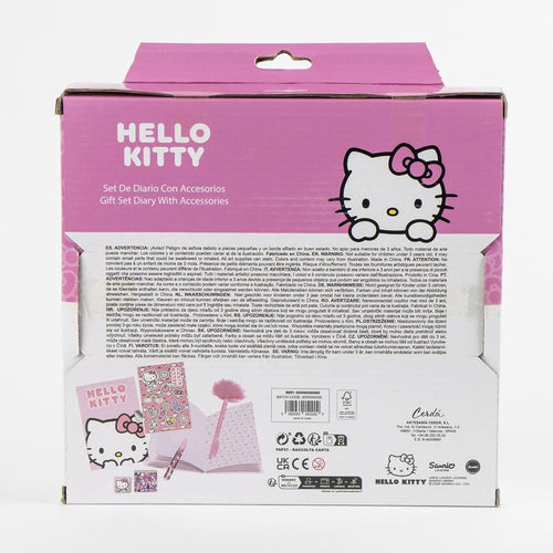 Journal Hello Kitty ouvert avec stickers et éléments déco pour écrire et décorer