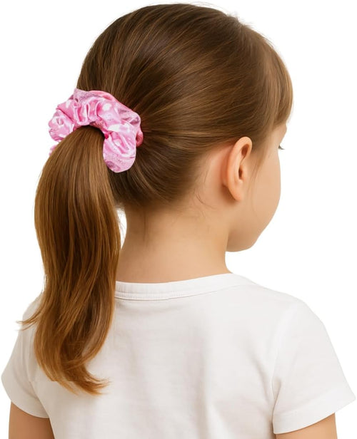 Détail des scrunchies et jarretières Peppa Pig aux tons roses et pastels