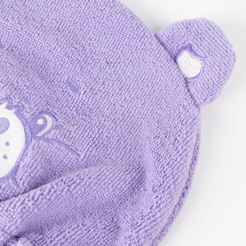 Serviette pour cheveux Bisounours portée en turban, maintien confortable après douche