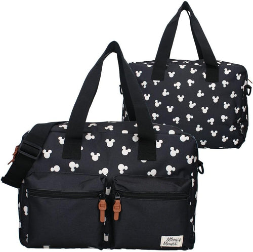Détail du motif Mickey Mouse discret sur le sac à langer noir