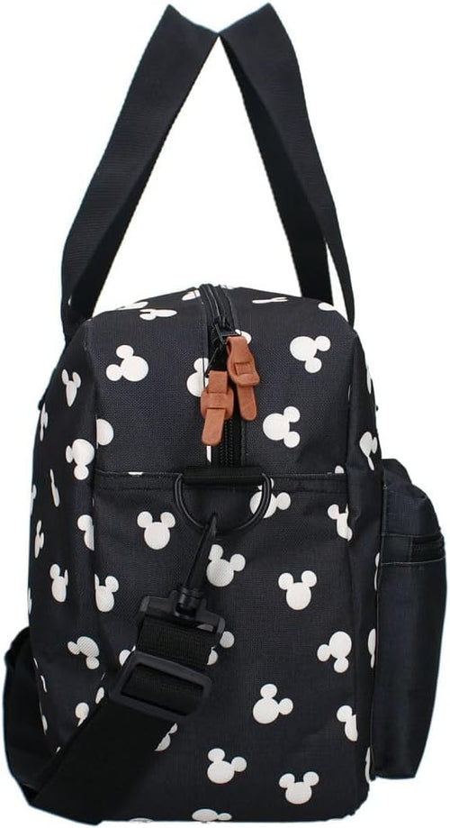 Vue de face du sac à langer avec ses deux poches avant zippées