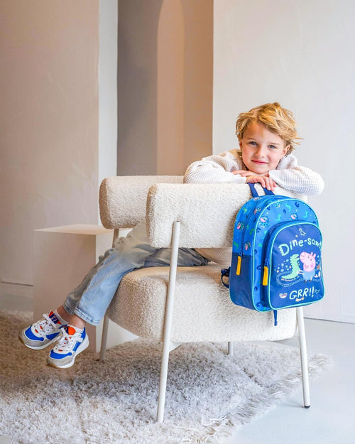 Vue de dos du sac à dos enfant Peppa Pig montrant les bretelles et la poignée de portage