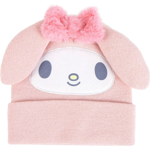 Bonnet rose à motifs dessin animé posé sur fond neutre