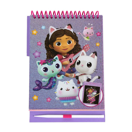 Couverture violette pailletée du carnet Gabby et la Maison Magique avec stylo rose