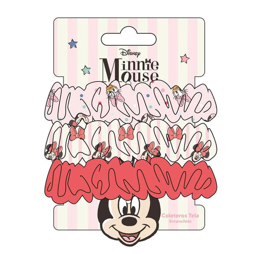 Trois chouchous Minnie Mouse posés à plat, deux imprimés et un uni