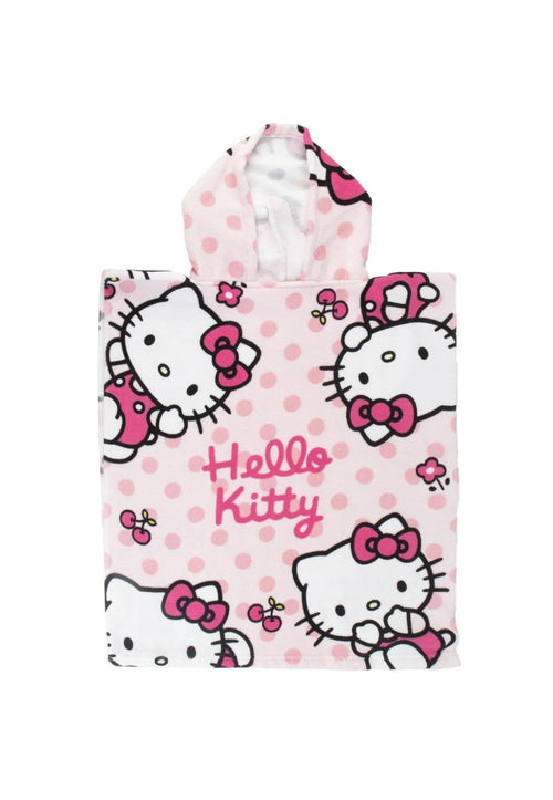 Serviette de plage Hello Kitty rose clair étalée sur le sable