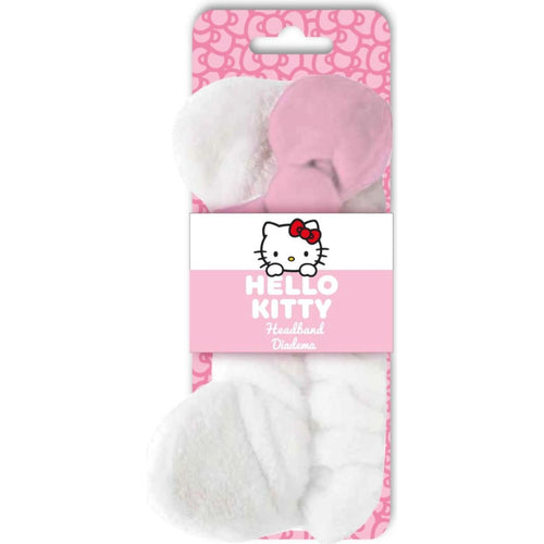 Turban Hello Kitty rose en peluche posé sur fond blanc
